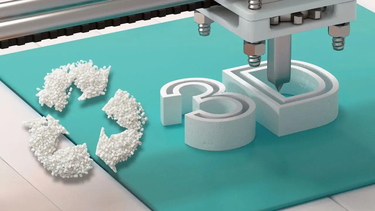 3D printer nozzle fabricating a textured "3D" shape beside a recycling symbol made of white polymer powder pellets on a teal surface.