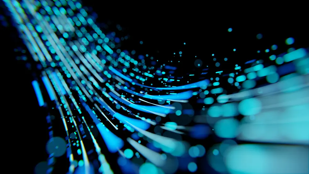 Vibrant blue and cyan light trails on a dark background, representing advanced thermal analysis technology and data visualization.