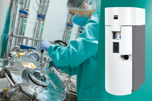 Technician in teal scrubs operates lab equipment, ensuring precise analysis with advanced apparatus for optimal results.